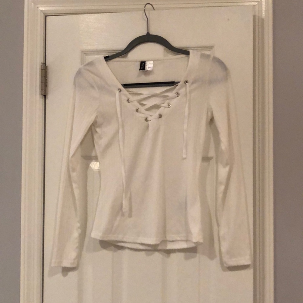 Long sleeved tie up neck shirt